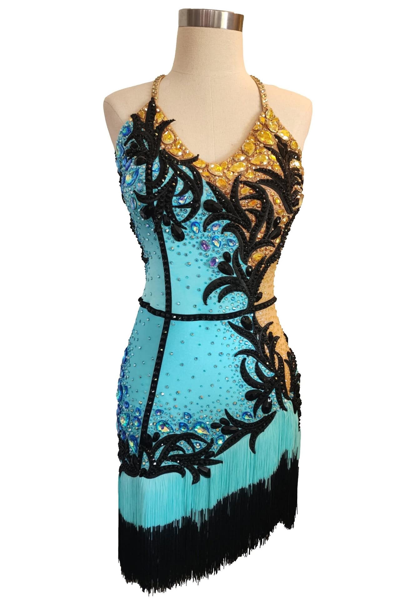 Jayla Latin dress - on mannequin - front view - Turquoise and gold bodice split with black appliqué and black/blue fringe skirt.
