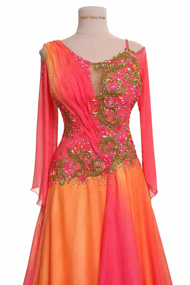 Silken Radiance ballroom gown with coral-to-orange sunburst ombre skirt and gold filigree bodice.