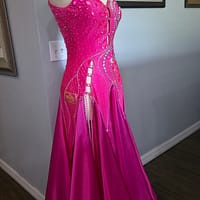 Side view of Malibu Dream ballroom gown showing fitted silhouette and flowing pink skirt
