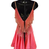 Saffron Heat Atelier Latin dress back view in coral with crystal embellishments, open back and layered ruffle skirt