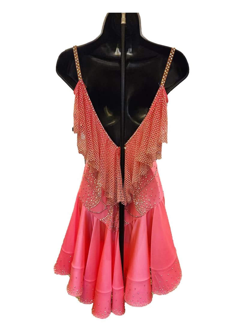 Saffron Heat Atelier Latin dress back view in coral with crystal embellishments, open back and layered ruffle skirt