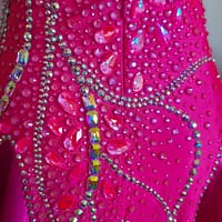 Back detail of Malibu Dream ballroom gown showing zipper and rhinestone embellishments