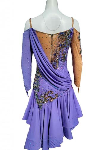 Clea Latin Dress — back view — mannequin displaying diagonal back draping, nude mesh panel, and crystal appliqué