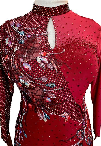 Talia Latin dress — bodice detail — close-up of fishnet mesh, red 3D floral appliqué, and iridescent teardrop crystals.