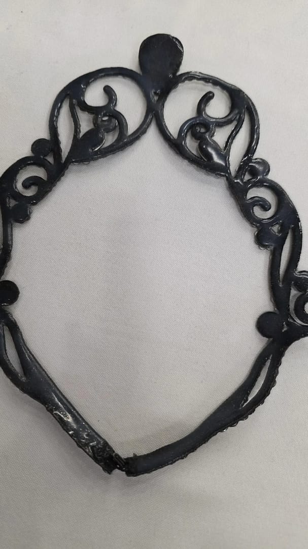 Back view of black ballroom necklace showing silicone base structure
