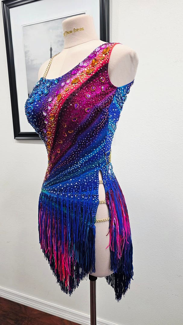 Chromatic Fire Latin dress side view with cutout details and fitted silhouette