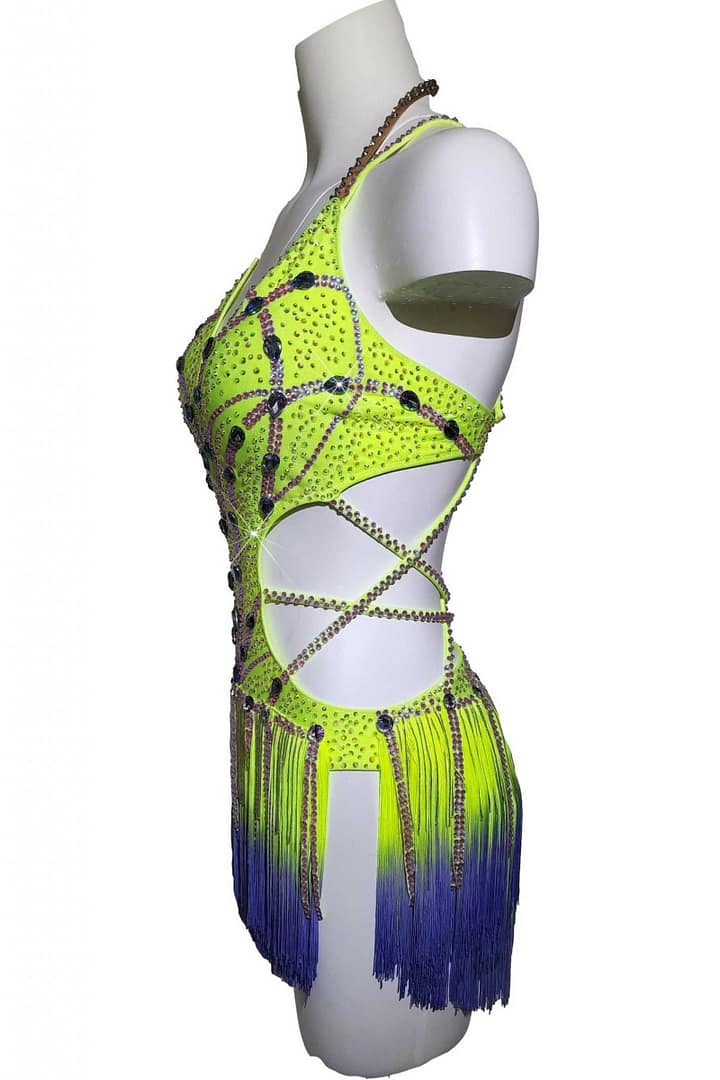 Sunshine Latin dress - side view — neon yellow Latin dress with crystal cut-out detailing, rhinestone straps, and ombré fringe fading into deep purple.