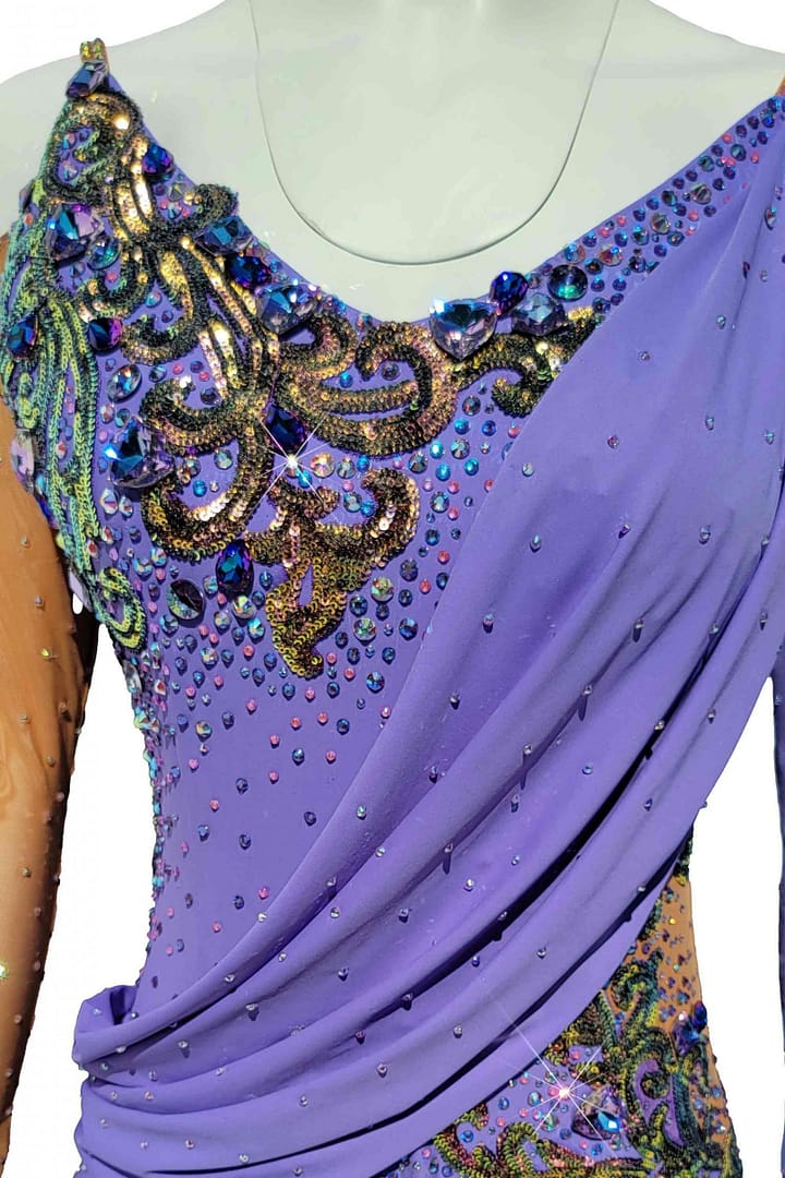 Clea Latin Dress — bodice detail — close-up of lavender fabric with copper sequins, turquoise, blue, and crystal stoning
