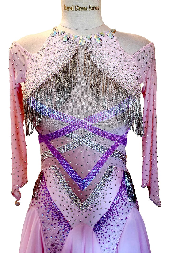 Labana ballroom gown — bodice detail — Criss-cross and chevron patterns of high-density, hand-applied crystals creating a striking, structured design over a sheer nude mesh base.