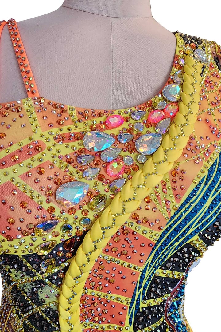 Solar Flame Latin dress bodice detail intricate hand-applied crystals in geometric design