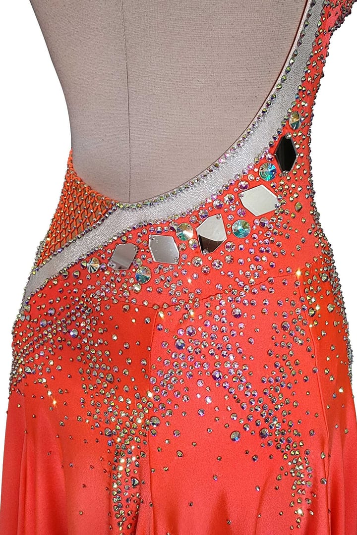 Sola Latin dress — stonework close-up — large clear and small rhinestones forming curved accents