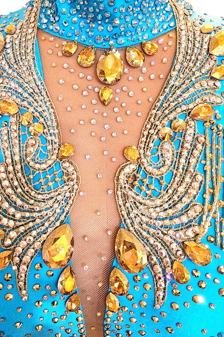 Hadley ballroom gown — stonework close-up — dense gold and AB crystals with intricate patterns