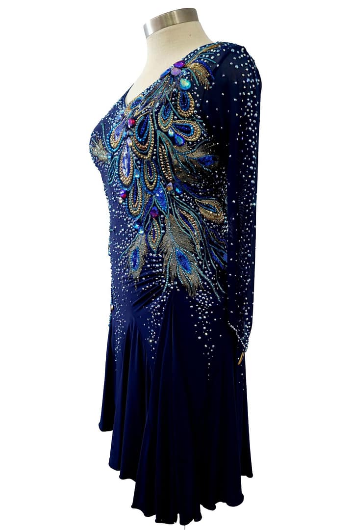 Close-up of navy ballroom dress bodice with hand-applied crystal feather motifs