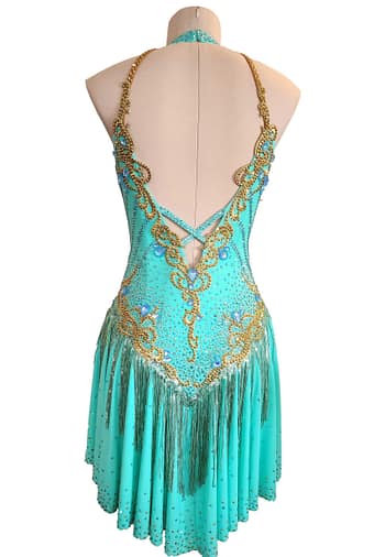 Ashcroft Latin dress - back view - Teal fabric, gold appliqué, open V-back, and fringe skirt.