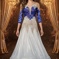 Blue Sonata ballroom gown — front view — Standard gown with white taffeta skirt and a bodice featuring deep blue crystal-encrusted lace over nude mesh, accented with large white lace appliqués and pearl fringe.