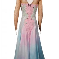 Cari ballroom gown — back view — Low, deep V-back accented with crystal stoning, a long, flowing skirt with layered godets, and sheer fabric floats attached at the wrists.