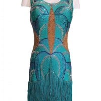Undina Latin Dress — in mannequin — front view of teal dress with scallop-like crystal pattern and nude mesh cutouts