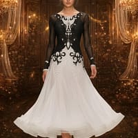 Midnight Elegance ballroom gown — front view — long sheer black sleeves, intricate crystal work on the bodice, and voluminous white skirt.