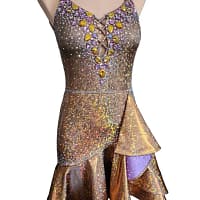 Lily Latin Dress — in mannequin — front view of gold dress with deep purple ruffle lining and heavy jeweled bodice