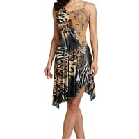 Kaya latin dress — front view whole body — full-length view of a woman wearing a short, asymmetrical Latin dress featuring mixed leopard and zebra print, with a nude crystal-embellished bodice and handkerchief skirt.