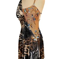 Kaya Latin dress — 3/4 side view — sleeveless Latin dress with a draped animal print front and a handkerchief hemline trimmed with blue crystals.