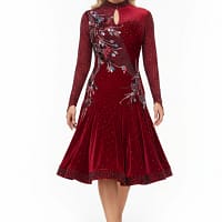 Talia Latin dress — front view whole body — long sleeves, pleated velvet skirt, and diagonal red appliqué embellishment.