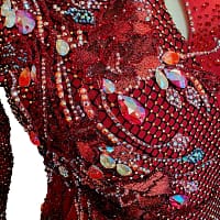 Talia Latin dress — stonework close‑up - keyhole cutout, and rhinestone scatter on the smooth velvet side panel.