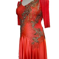 Crush Latin dress — 3/4 view — showcasing the rhinestone lattice on the bodice and the high-low hemline of the skirt.