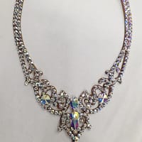 Full design view of crystal ballroom necklace featuring ornate crystal arrangement and teardrop center stone.