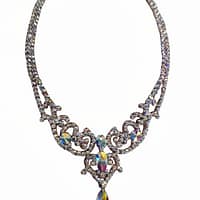 Isolated crystal ballroom necklace with AB stones and teardrop pendant for professional dance competitions.