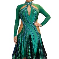Kalinda emerald green Latin dance dress with long sleeves, keyhole neckline, and sapphire crystal swirl design shown full length on model