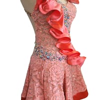 Luisa side view highlighting satin ruffle accent and fitted Latin silhouette