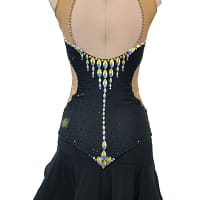 Back view of Midnight Rhythm Latin mode dress featuring open illusion back, cascading crystal drop design, and layered black ruffle skirt.
