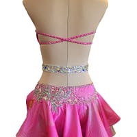 Back view of pink Latin dress with open back and crystal strap detailing