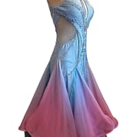 Detailed close-up of crystal stonework on ballroom gown featuring iridescent stones arranged in symmetrical patterns