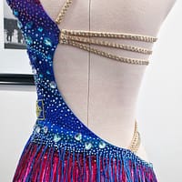 Chromatic Fire Latin dress back view with rhinestone straps and open back design