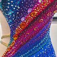 Chromatic Fire Latin dress bodice detail with multicolor gradient and large crystal stones