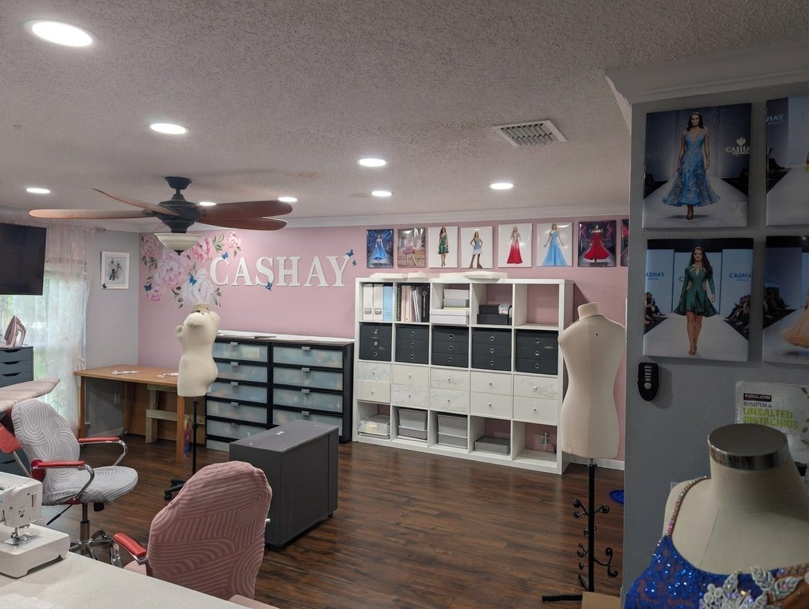 Cashay Ballroom design studio with dressmaker mannequins and sewing stations.