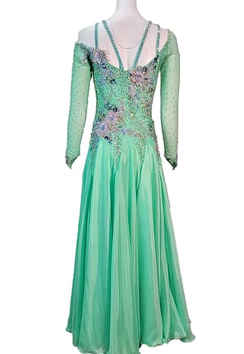 Rain ballroom dress — back view — full-length, light green gown with an open V-back and shoulder straps made of crystal chains.