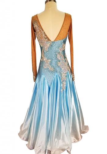 Bluesky ballroom gown — back view — deep V-back with nude mesh and crystal detailing, full ombré satin skirt