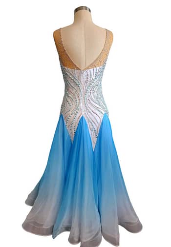 Cyra Ballroom gown. - back view - Deep V-back, crystal bodice, full blue ombre skirt volume.