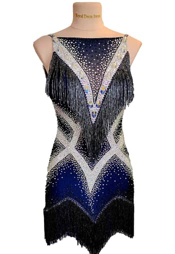 Arlan Latin dress — front view — mannequin — deep navy blue dress with striking white crystal chevrons and black beaded fringe.