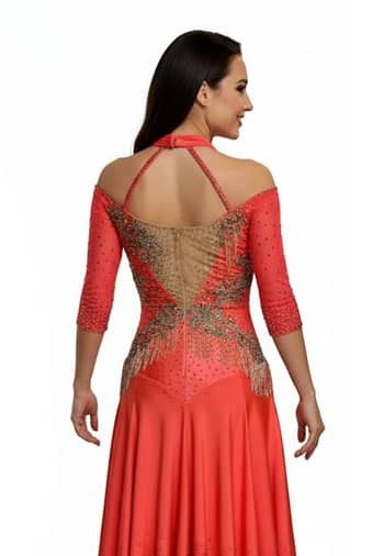 Crush Latin dress — back view — open back with nude chiffon floats and multi-layered orange fringe.