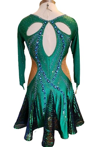 Back view of Kalinda Latin dress with oval open-back cutout, crystal trim, and short skirt with shimmering movement panels