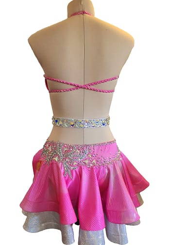 Back view of pink Latin dress with open back and crystal strap detailing