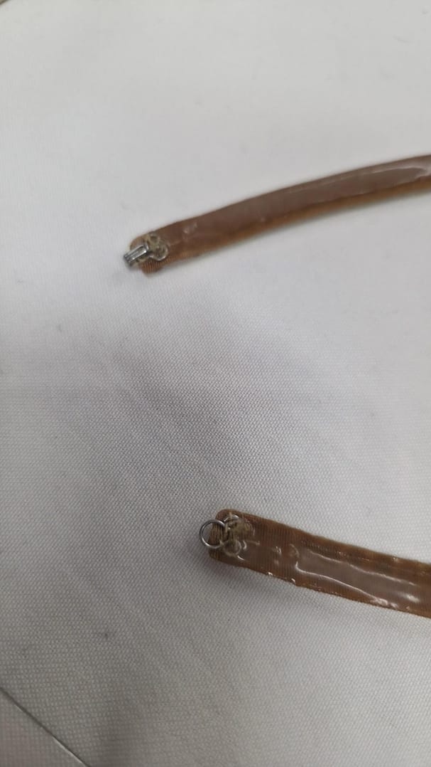 Back view of crystal ballroom necklace showing silicone backing and secure clasp for stable fit during dancing.