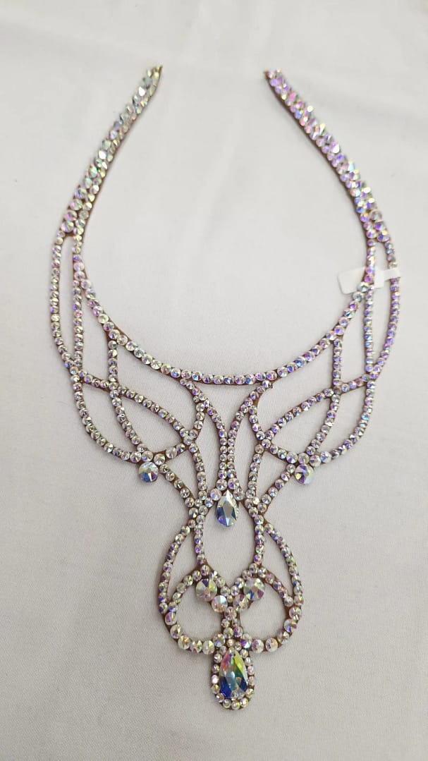 Full view of crystal filigree ballroom necklace with symmetrical flowing design