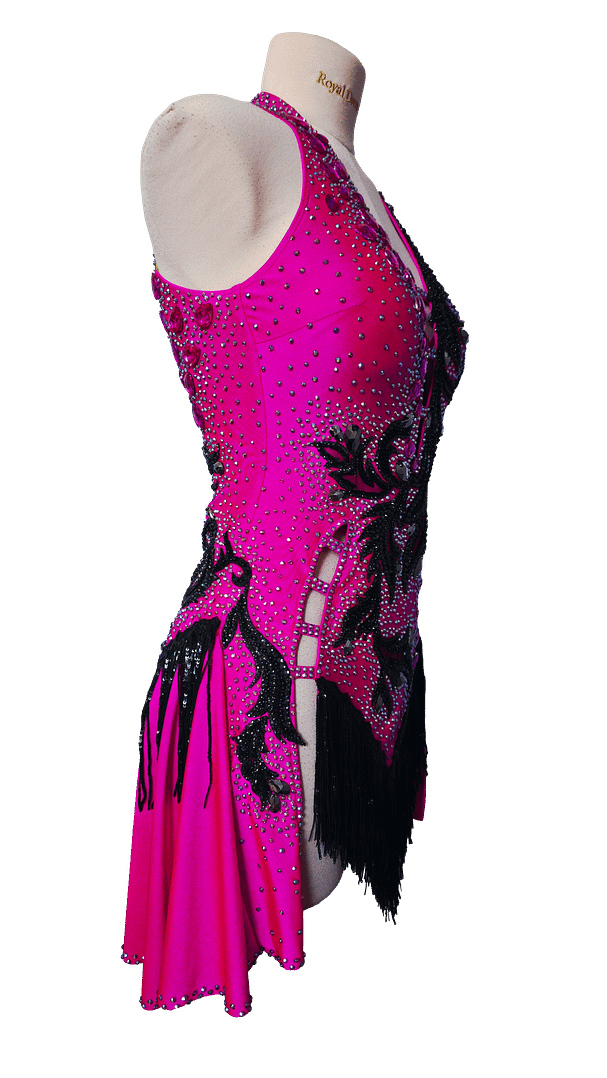 Right side view of Performance – Fuchsia Dominion showcasing fuchsia base, black lace appliqués, and sculpted competition fit.