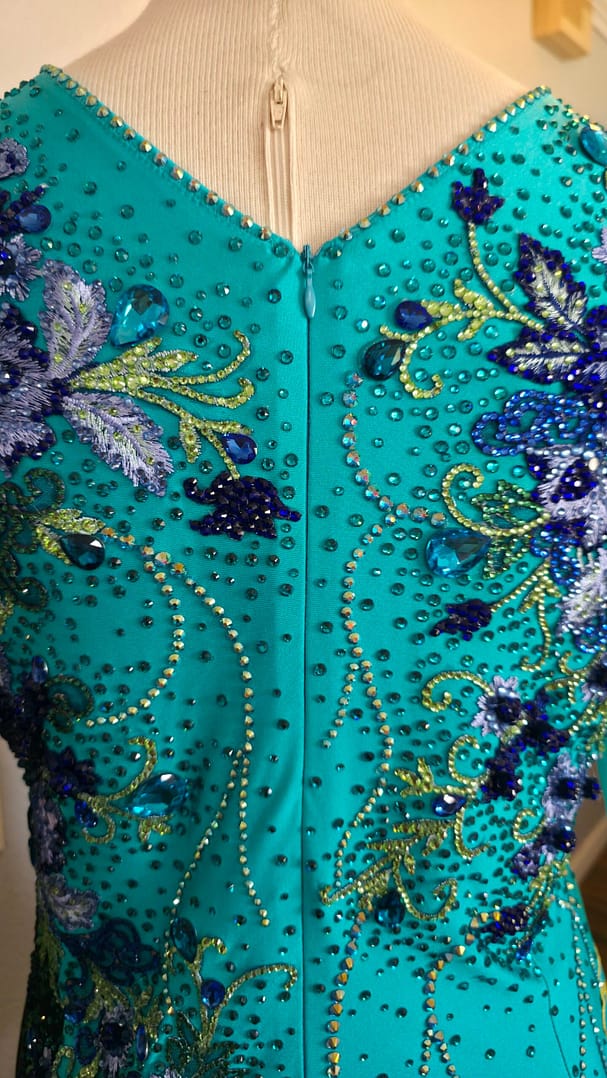 Electric Bloom ballroom dress back detail featuring rhinestones and floral crystal patterns