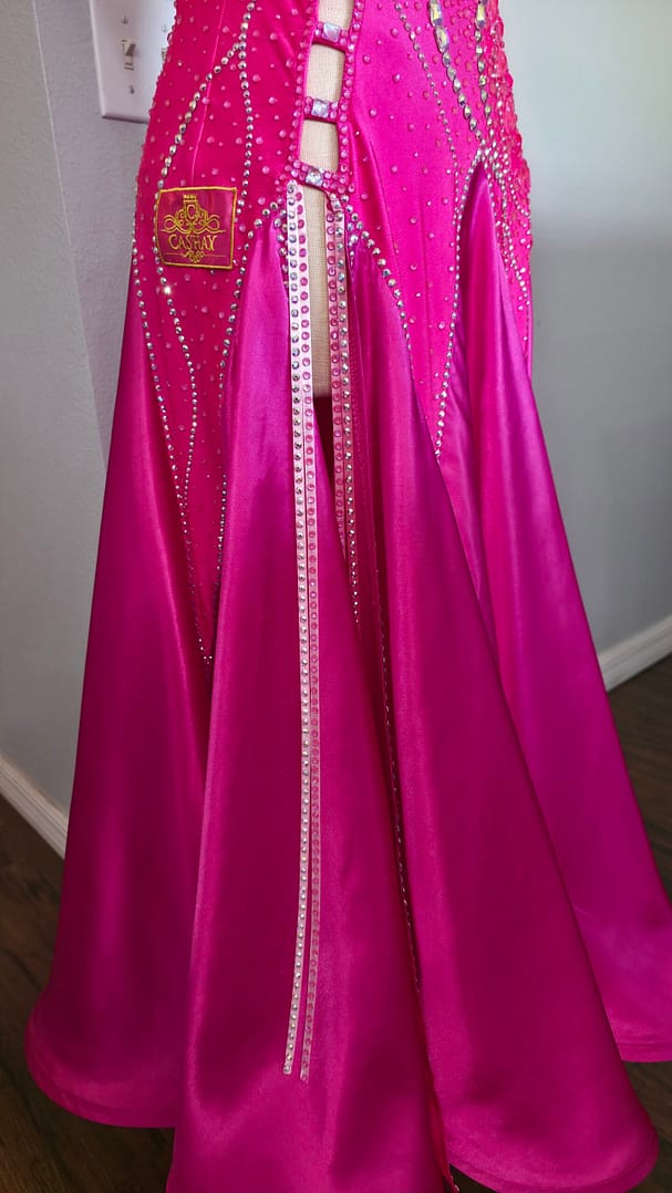 Detail of Malibu Dream ballroom gown skirt with satin fabric and crystal accents